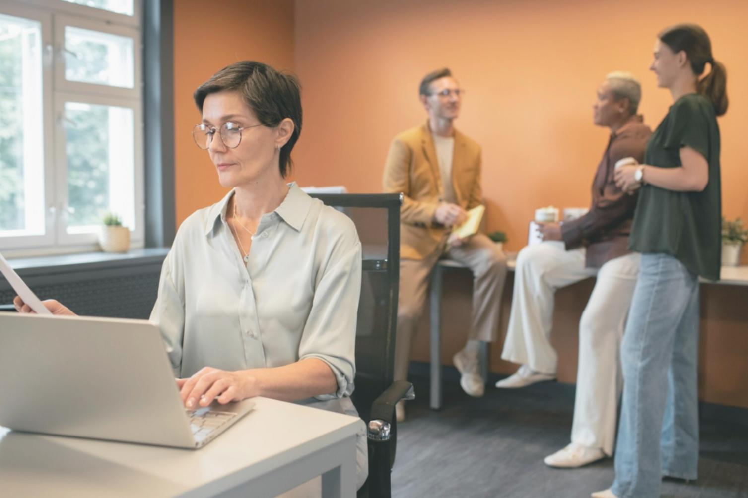 Successful business owner reviewing improved financial reports and budget allocations